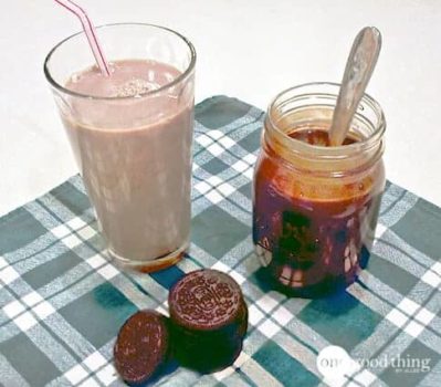 A Super Special jar of Homemade chocolate syrup and a glass of milk.