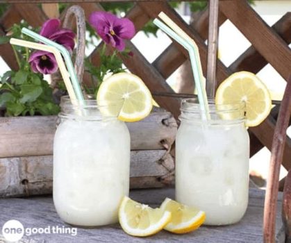 Two Brazilian mason jars with strawberry lemonade.