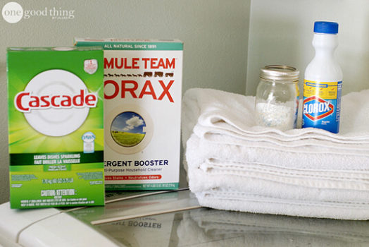A laundry room with a bottle of laundry detergent and a bottle of laundry soap, offering tips on caring for clothing.