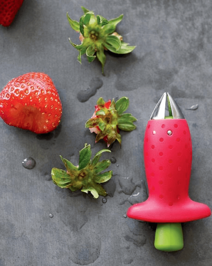 Must have kitchen gadgets for summer Must have kitchen gadgets for summer - strawberry huller with strawberry tops and hulled berry