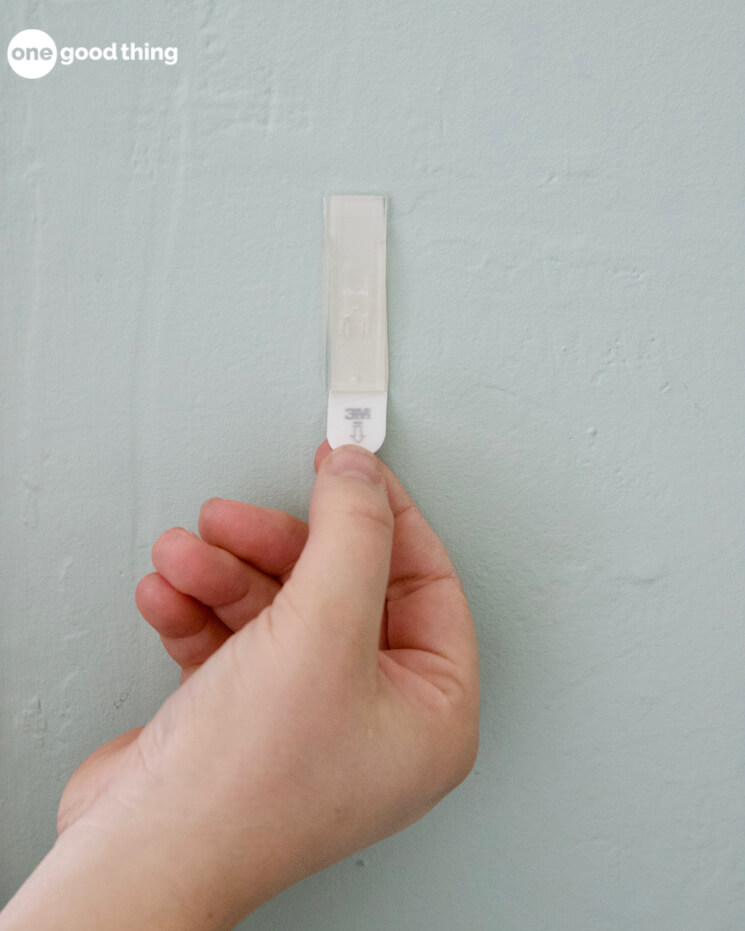 To remove Command Strips, pull straight down on the tab, not out.