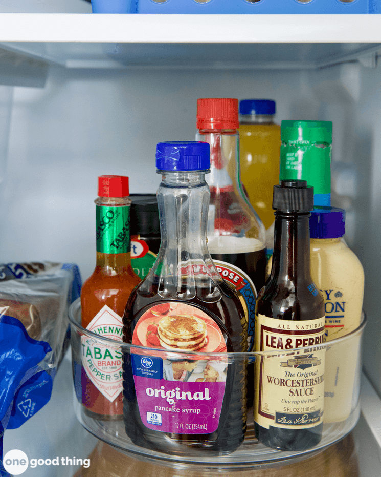 lazy susan hacks in a refrigerator various bottles in a lazy susan in a refrigerator