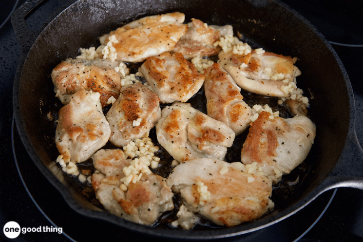 Step 3: When the chicken is done, add the crushed garlic to the pan and cook for about 30 seconds, until the garlic is fragrant.