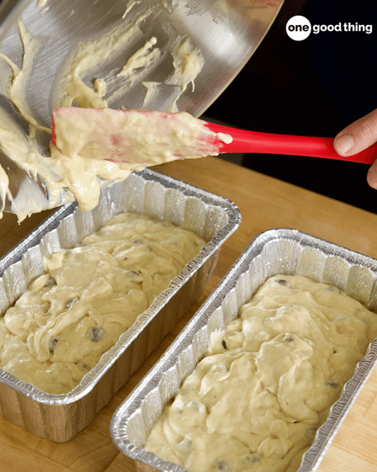 Pouring 4-Ingredient Banana Bread batter into loaf pans.