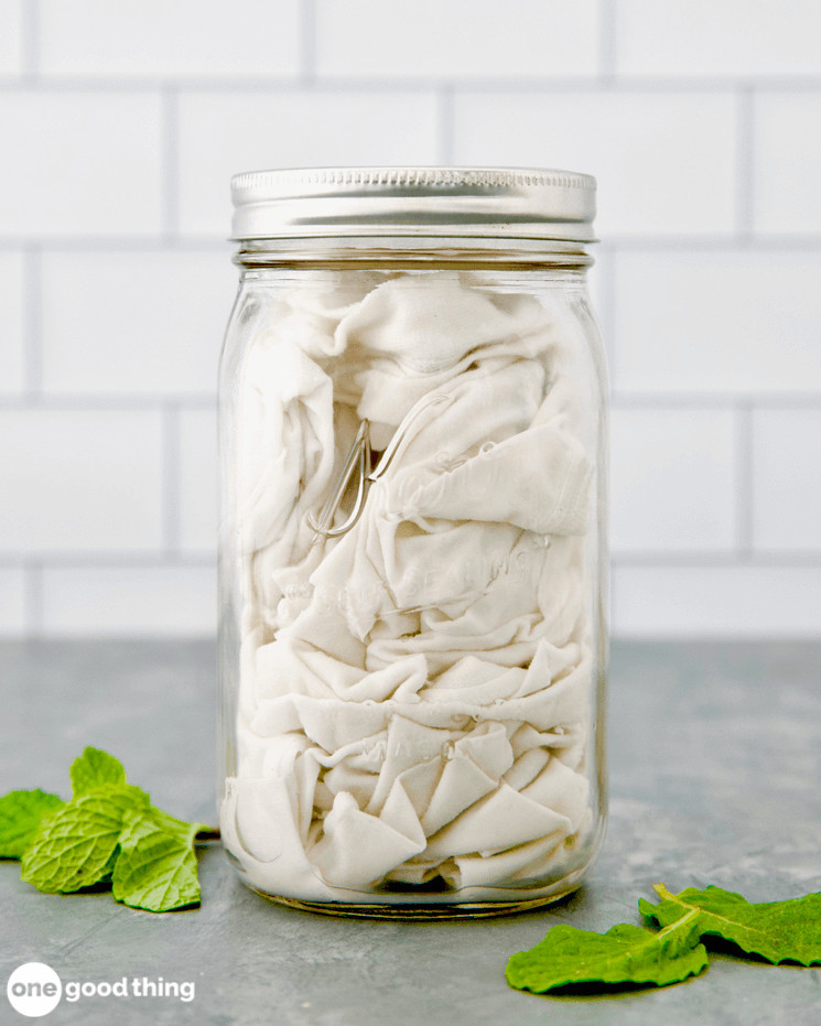 Store homemade wet wipes in a mason jar - it will look great on your kitchen counter and keep the wipes handy.