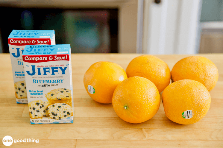 Campfire Foods - box of Jiffy blueberry muffin mix and five whole oranges