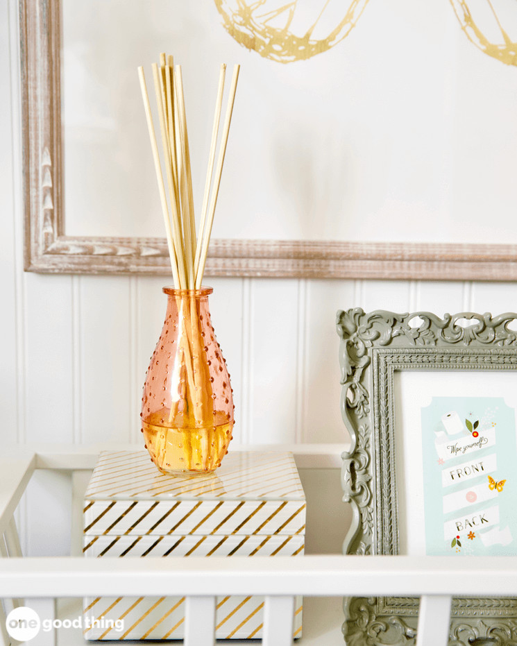 A reed diffuser filled with a mixture of essential oils and rubbing alcohol