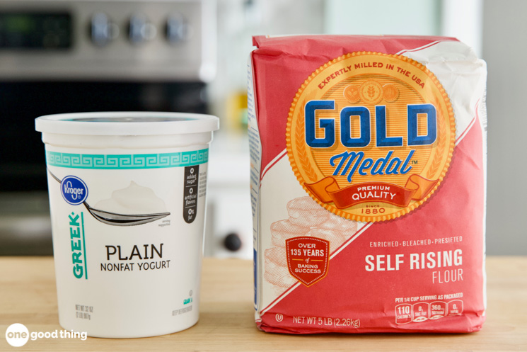 greek yogurt and self rising flour sitting on a kitchen counter