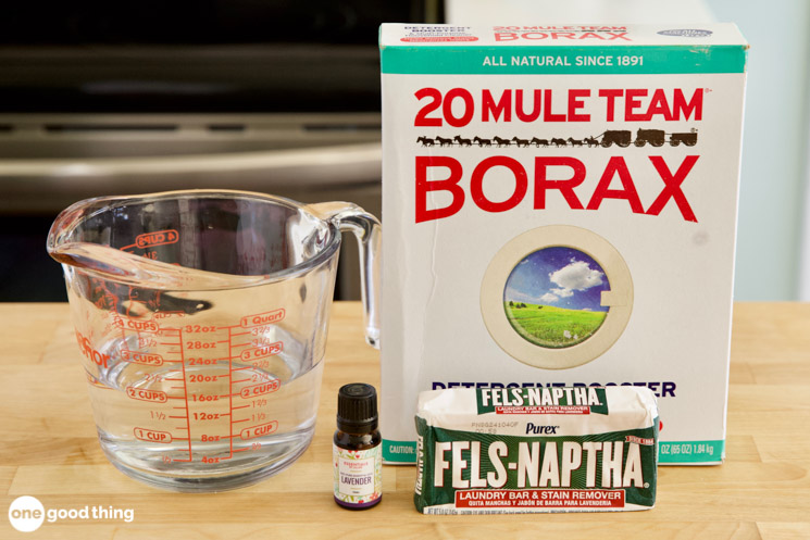 DIY Car Upholstery Cleaner DIY Car Upholstery Cleaner - measuring cup with water, box of borax, bar of Fels-Naptha, bottle of lavender essential oil