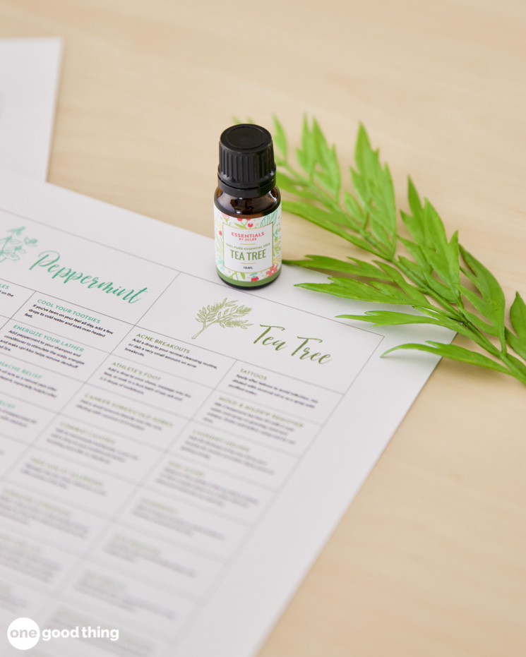 A sheet of paper with a bottle of tea tree essential oil on it, offering relief for everyday aches.