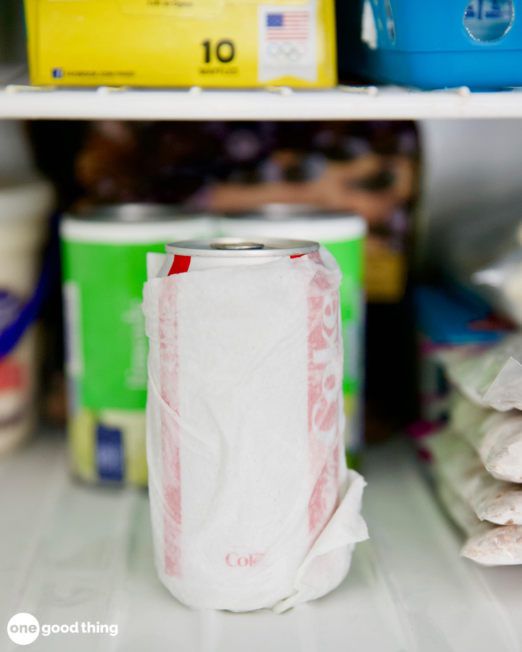 diet coke wrapped in a wet paper towel in a freezer