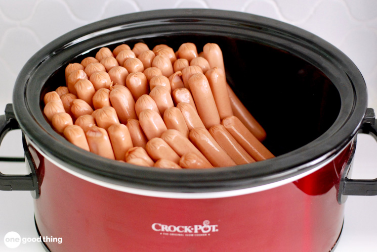 a bunch of hot dogs in a crockpot