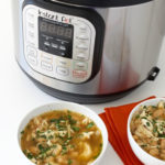 Two bowls of White Bean and Chicken soup in front of an Instant Pot.