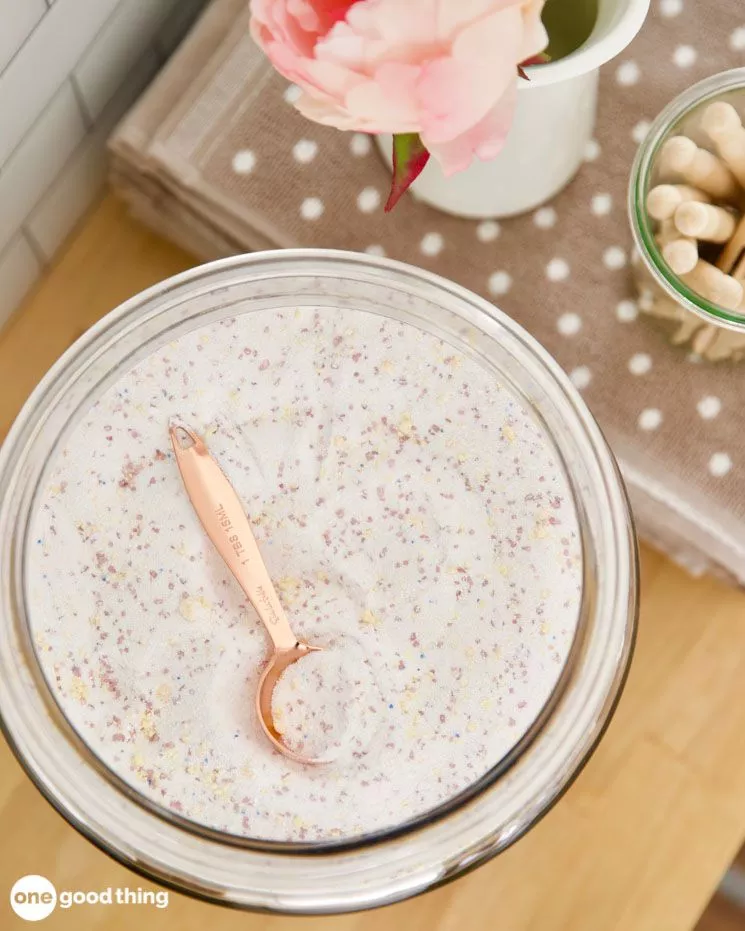A bowl of chia pudding with a spoon in it.