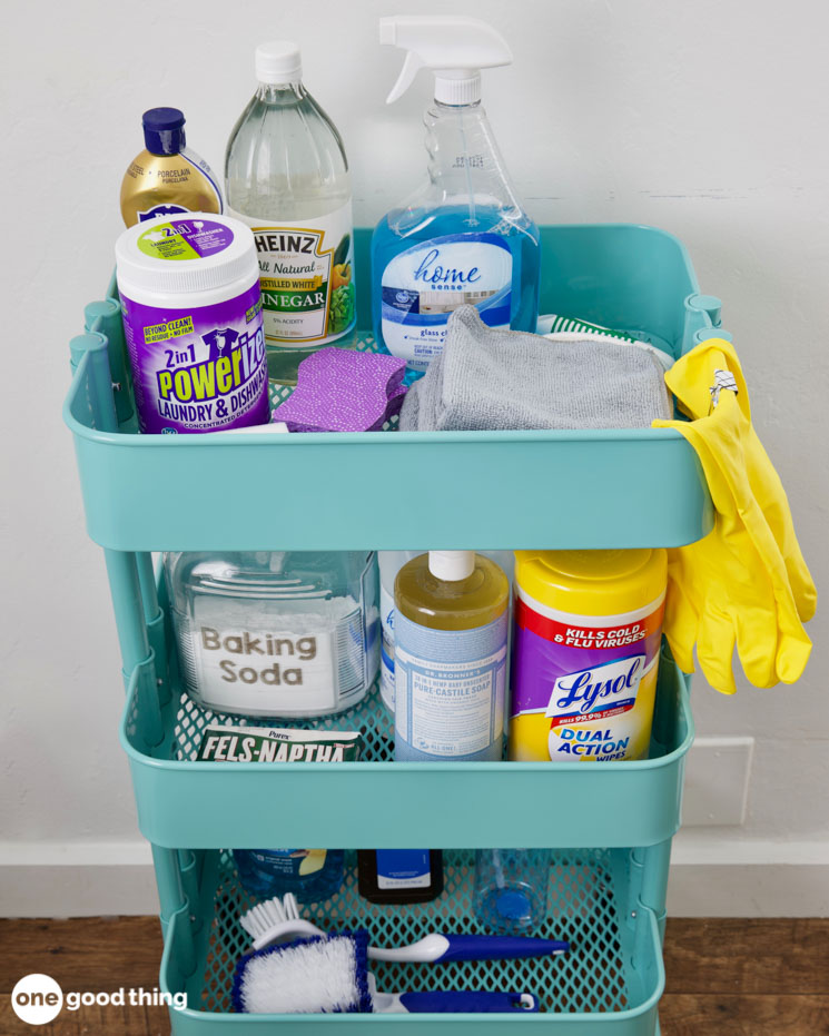 two layer rolling cart filled with cleaning supplies