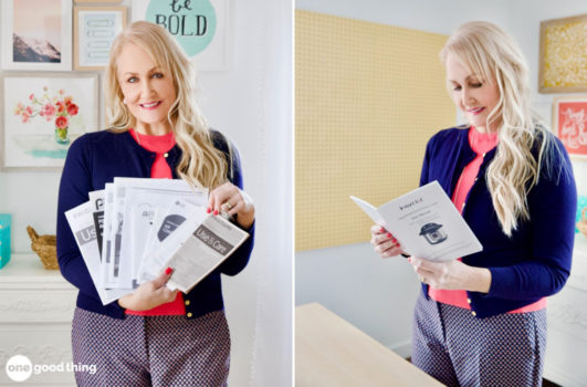 blond woman holding a bunch of user manuals/ blond woman reading a user manual