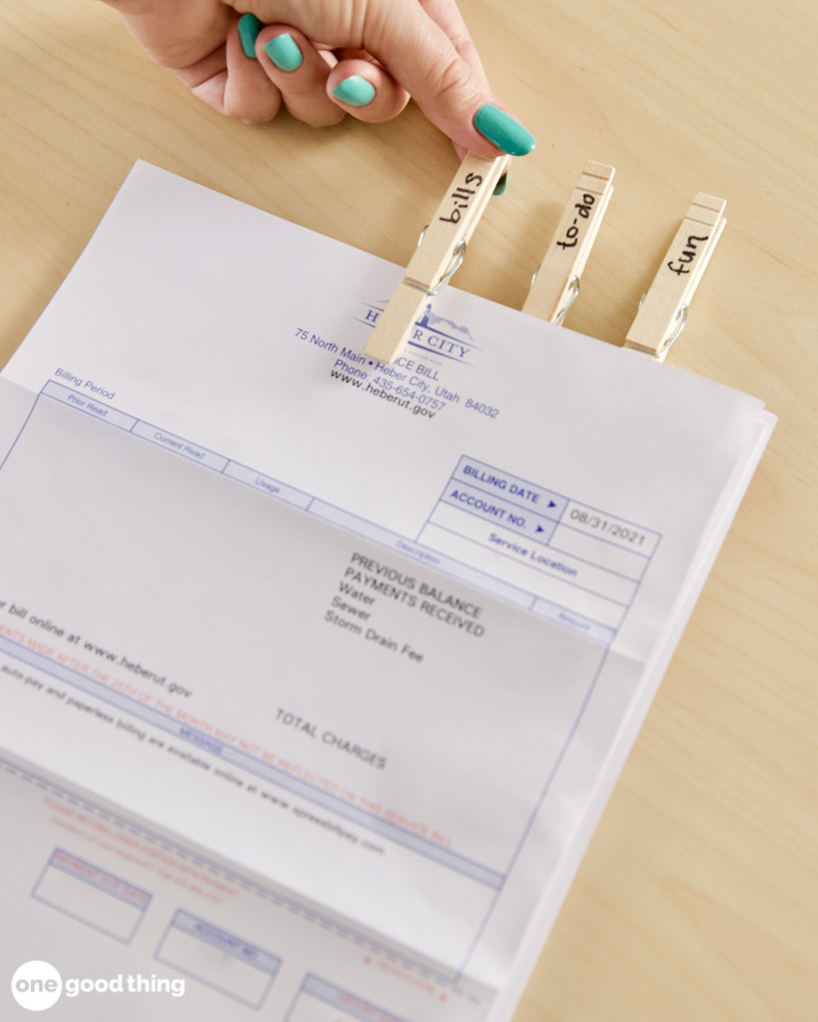 uses for clothespins - using labeled clothespins to organize paperwork