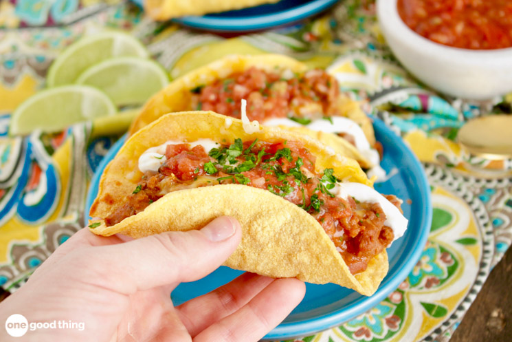 After filling your baked taco shells, top them with cheese and bake til hot and the cheese has melted. Serve with taco toppings.