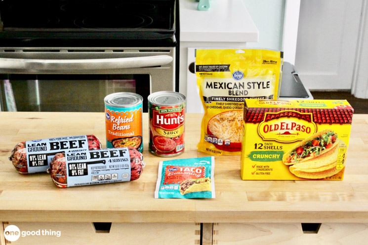 For baked tacos, all you need are taco shells, ground beef, refried beans, tomato sauce, taco seasoning, and taco shells -- plus toppings, of course!