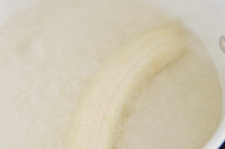 Make Banana Tea For Insomnia - banana in boiling water in sauce pan.