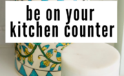 Text overlaid on an image of kitchen counter items reads "What should and should not be on your kitchen counter" with stylish decorative jars in the background.
