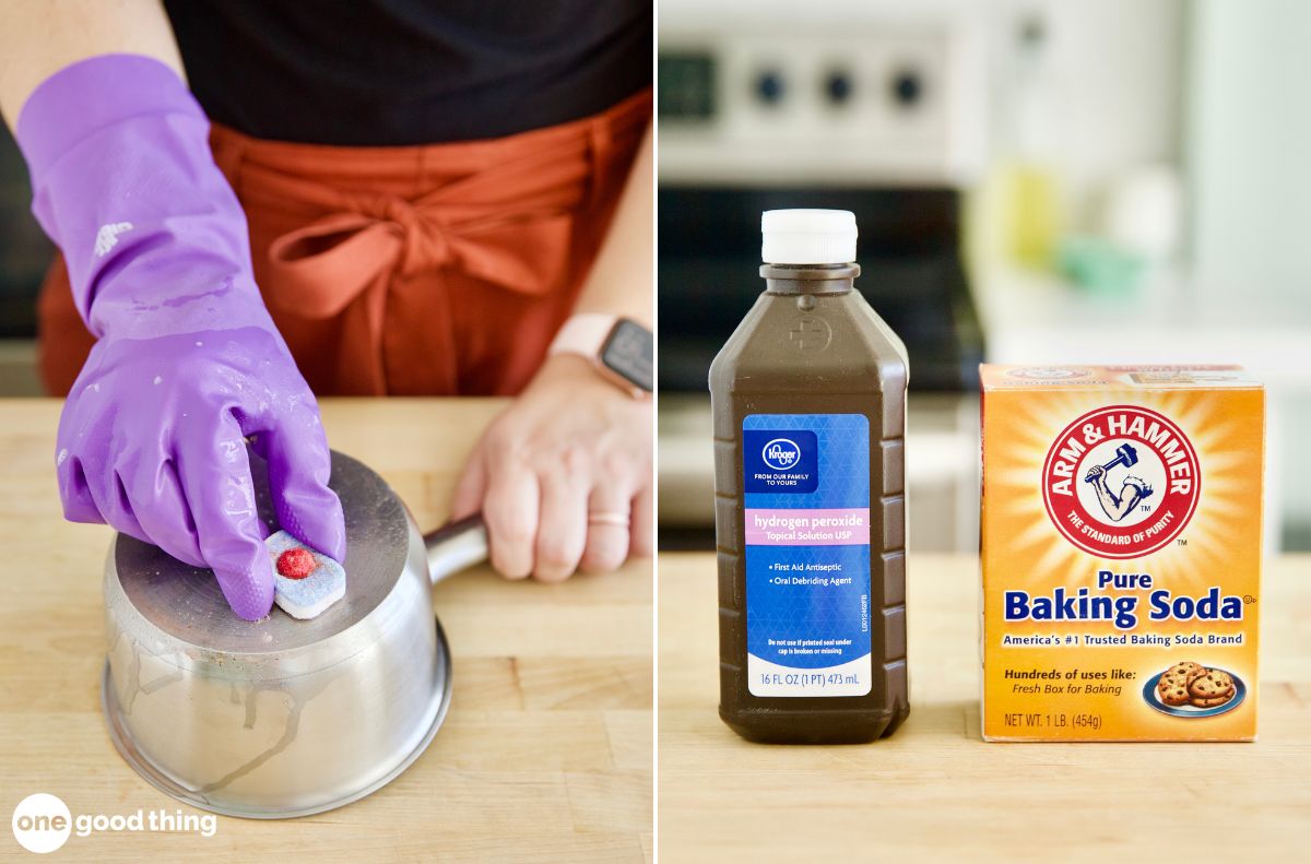 dishwashing hacks_11 A person wearing purple gloves scrubs a metal pot on a kitchen counter, with dishwashing supplies like hydrogen peroxide and a box of baking soda nearby.