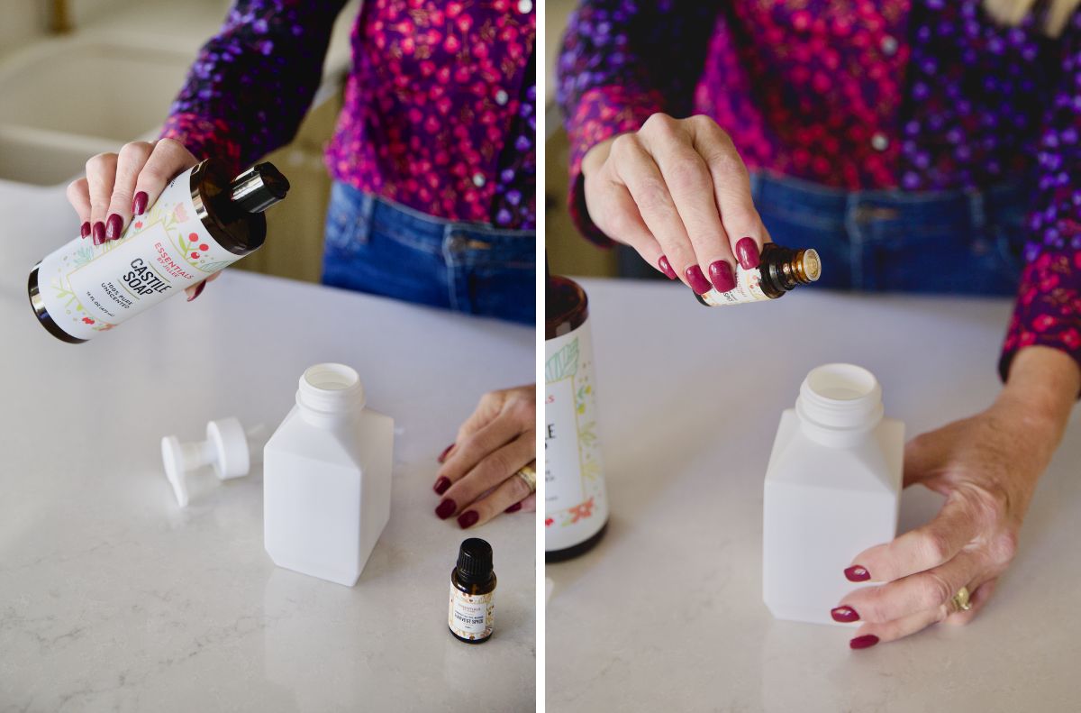 A person pours liquid, perhaps exploring castile soap uses, from a bottle and then a small vial into a white container on a countertop. Both bottles have colorful labels.