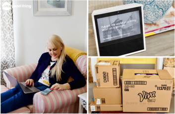 A woman uses a phone and laptop in an armchair; a smart display shows song lyrics, while boxes—ready to help her save money on Amazon—are stacked near the door.